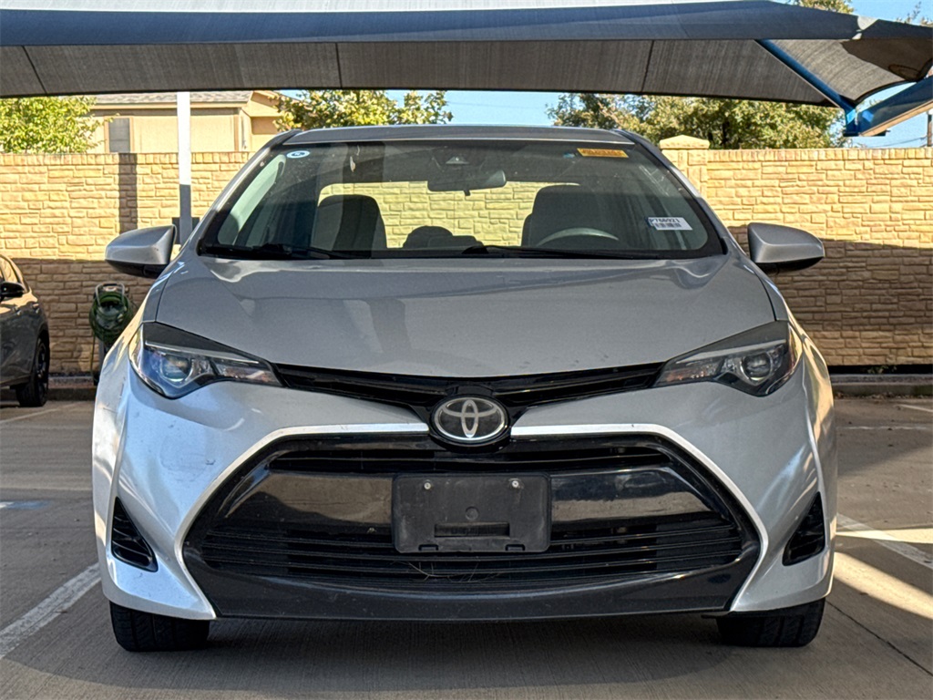 Used 2018 Toyota Corolla LE with VIN 5YFBURHE3JP786921 for sale in North Richland Hills, TX