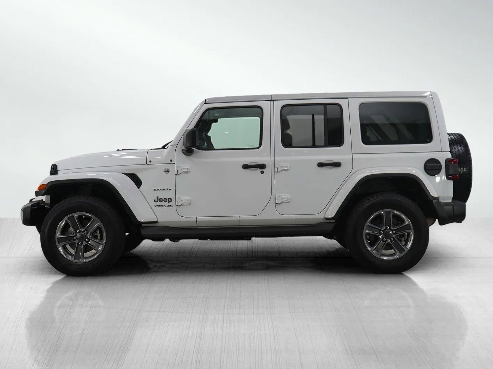 Used 2022 Jeep Wrangler Unlimited Sahara with VIN 1C4HJXEN6NW116112 for sale in Wayzata, Minnesota