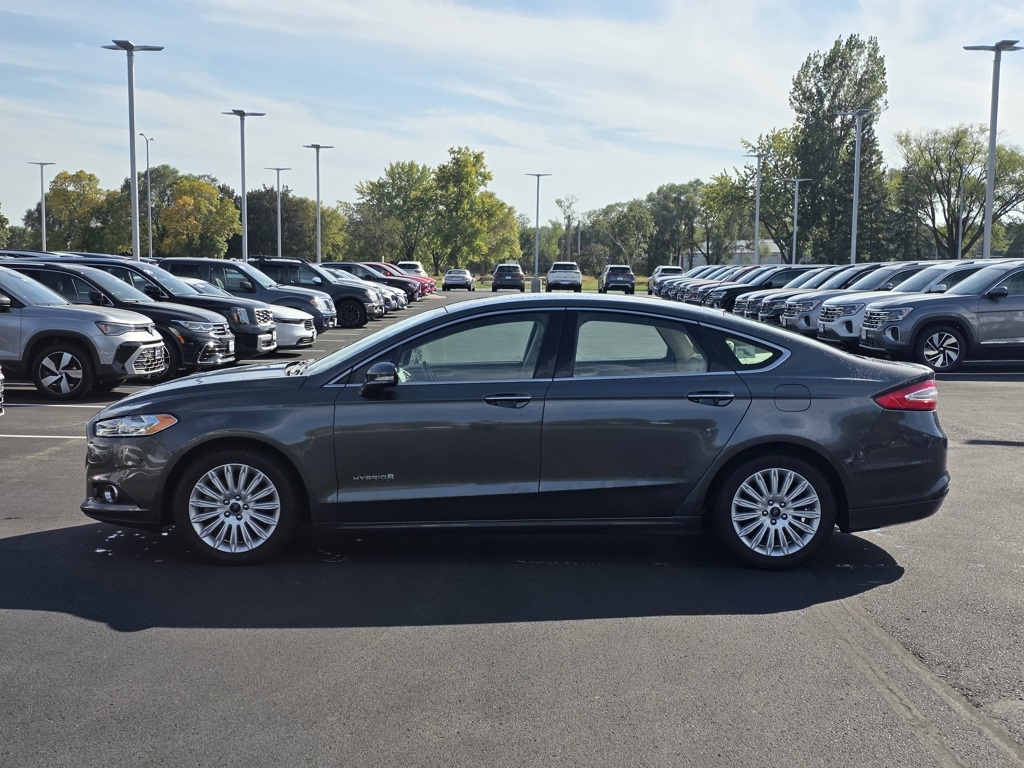 Used 2015 Ford Fusion Hybrid SE with VIN 3FA6P0LU1FR198963 for sale in St. Cloud, Minnesota