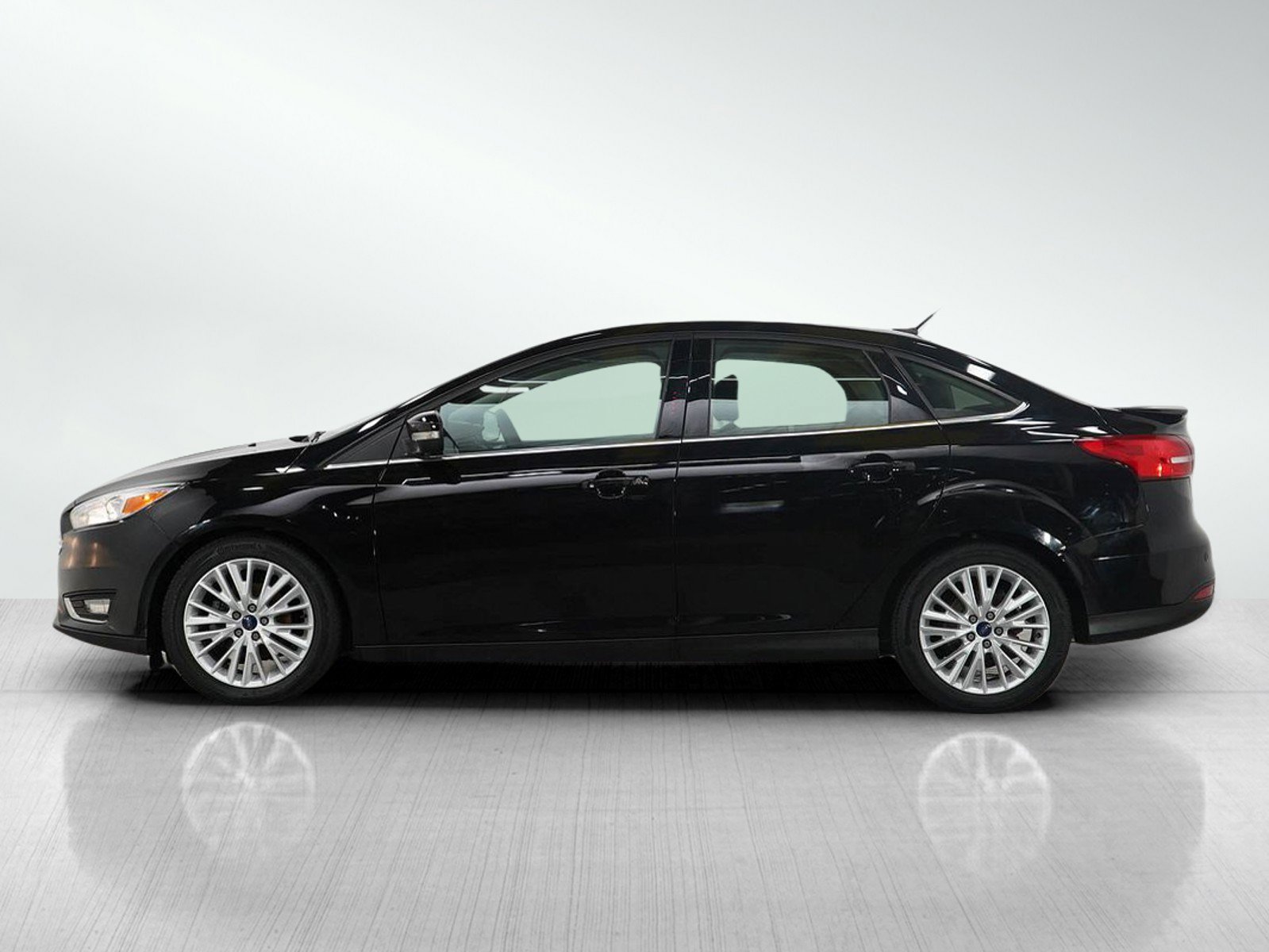Used 2016 Ford Focus Titanium with VIN 1FADP3J24GL306132 for sale in South Saint Paul, Minnesota