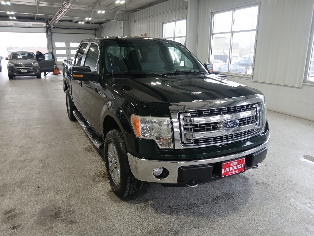Used 2014 Ford F-150 XLT with VIN 1FTFW1EF7EFA08886 for sale in Bettendorf, IA