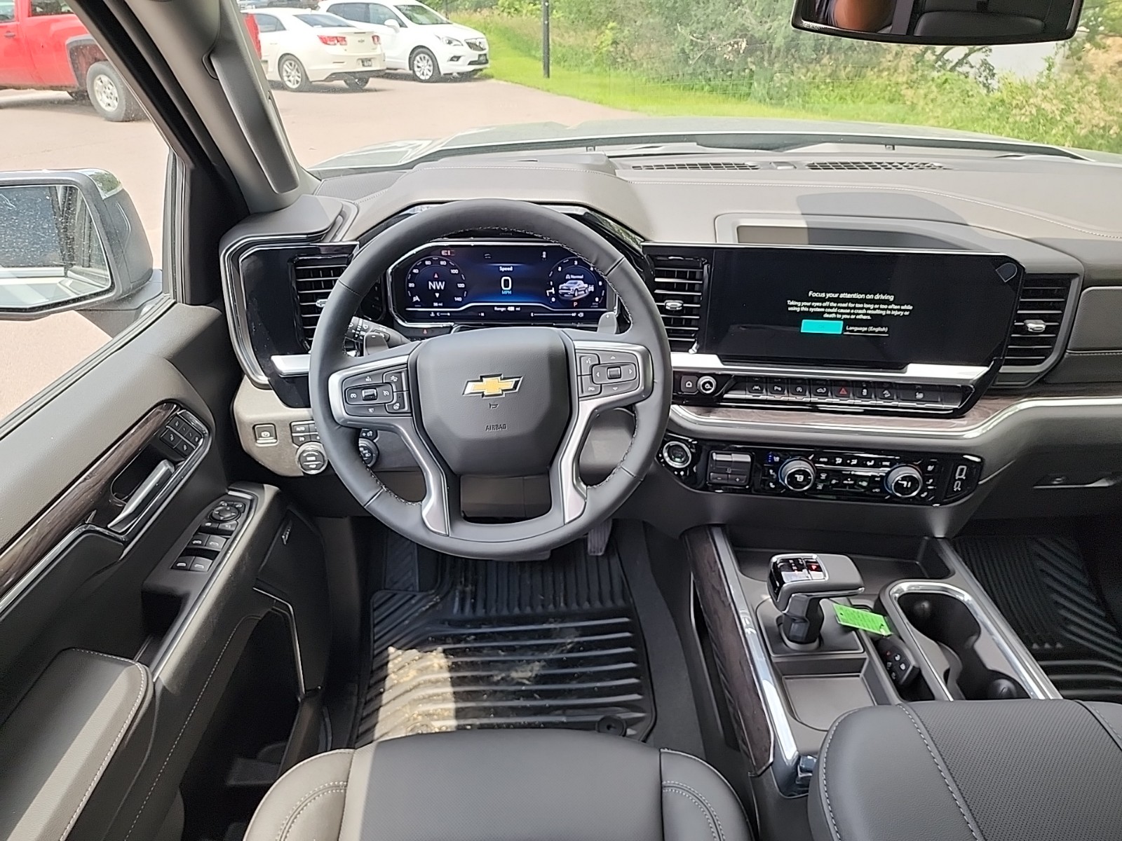 New 2024 Chevrolet Silverado 1500 LTZ 4D Crew Cab in Luverne C247557