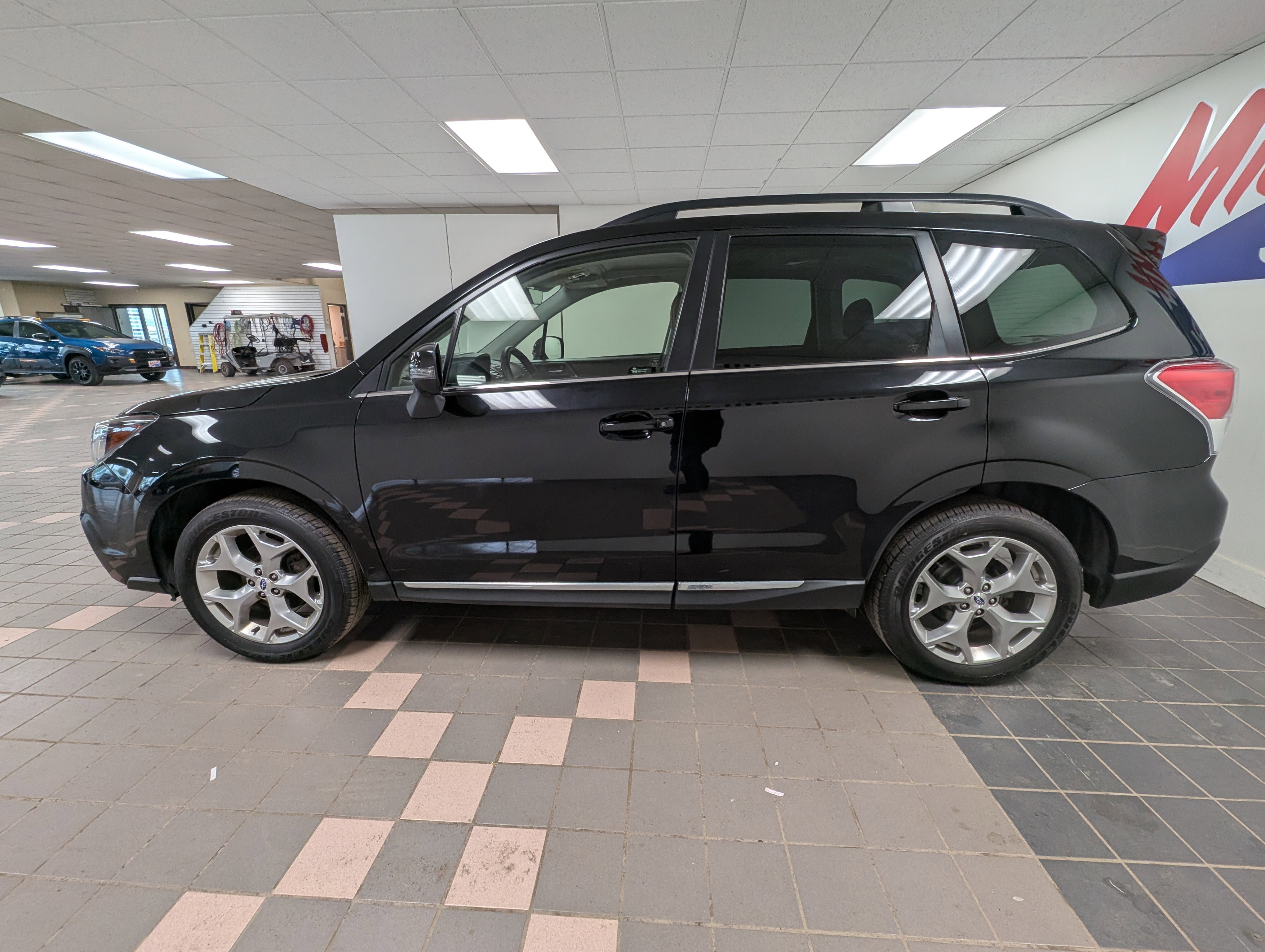 Used 2018 Subaru Forester Touring with VIN JF2SJAWC9JH413536 for sale in Hermantown, Minnesota