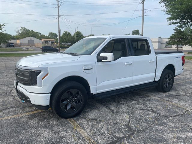 Used 2022 Ford F-150 Lightning Lariat with VIN 1FT6W1EV6NWG13330 for sale in Peoria, IL