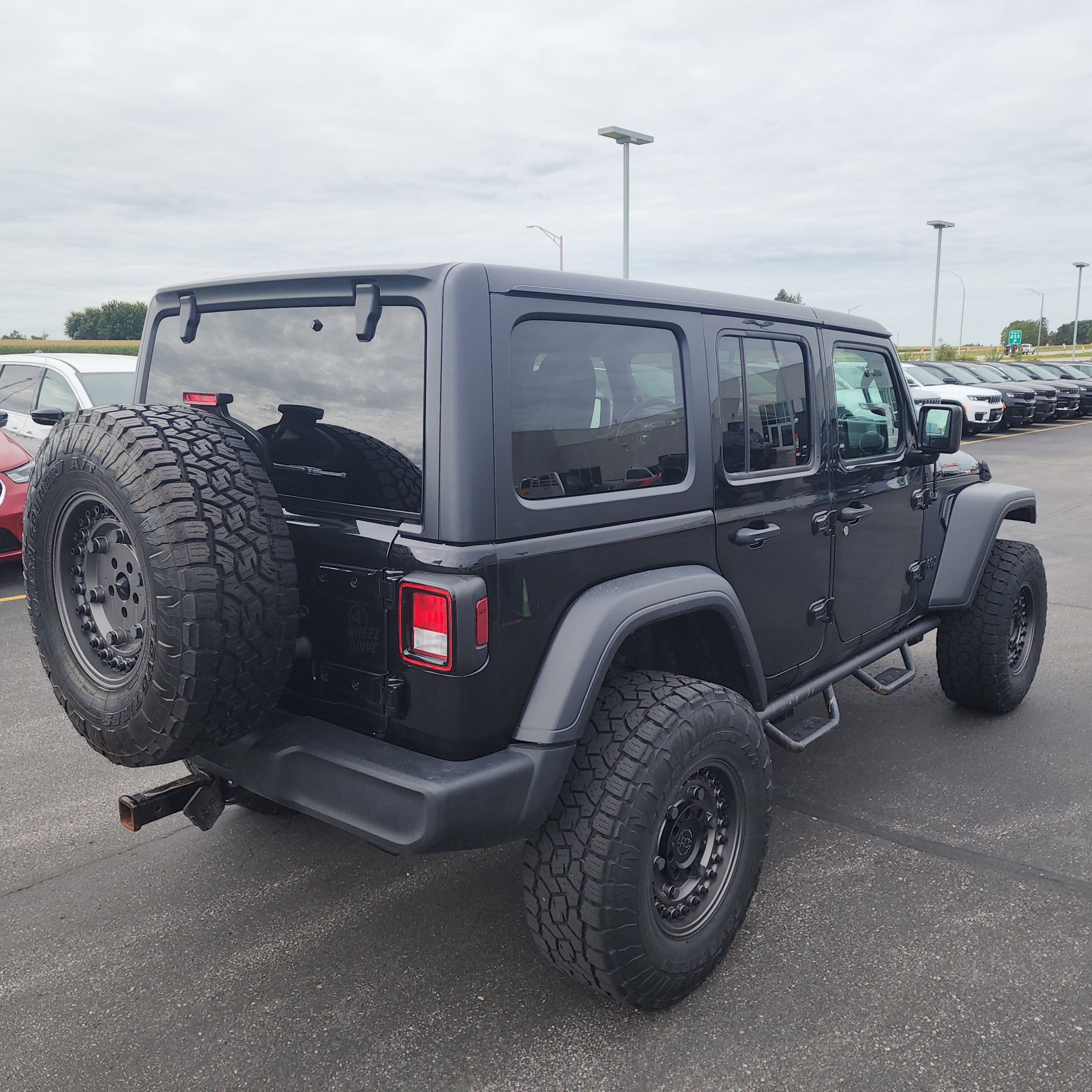 Used 2020 Jeep Wrangler Unlimited Willys with VIN 1C4HJXDG7LW253611 for sale in Saint Charles, Minnesota