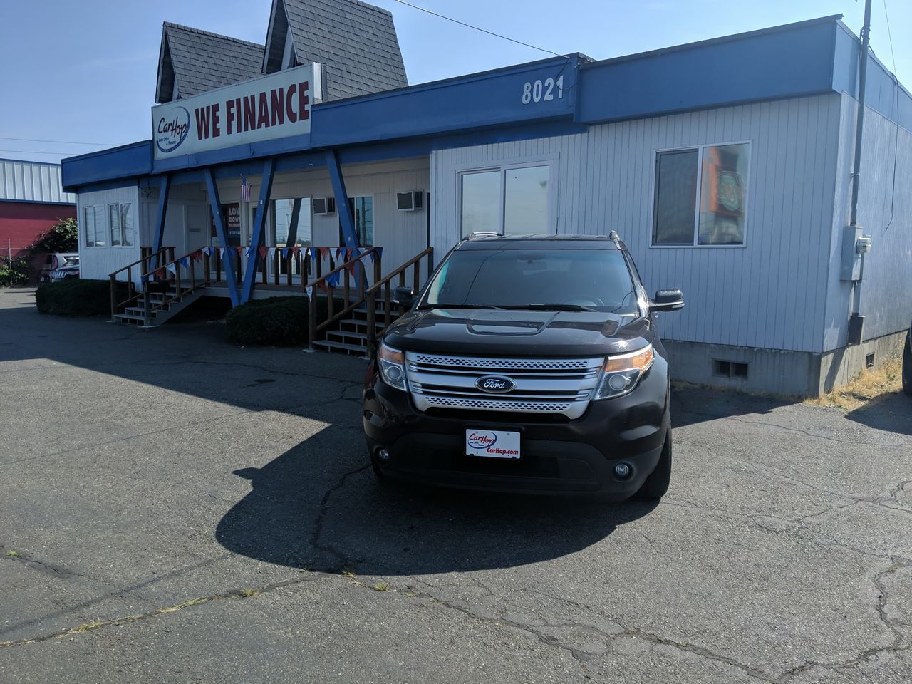 Used 2014 Brown Ford XLT 4WD image 1