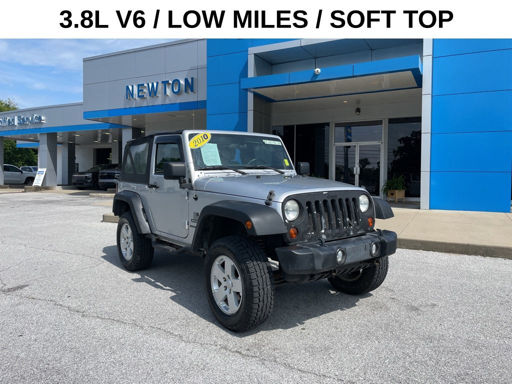 Used 2010 Silver Jeep Sport image 1
