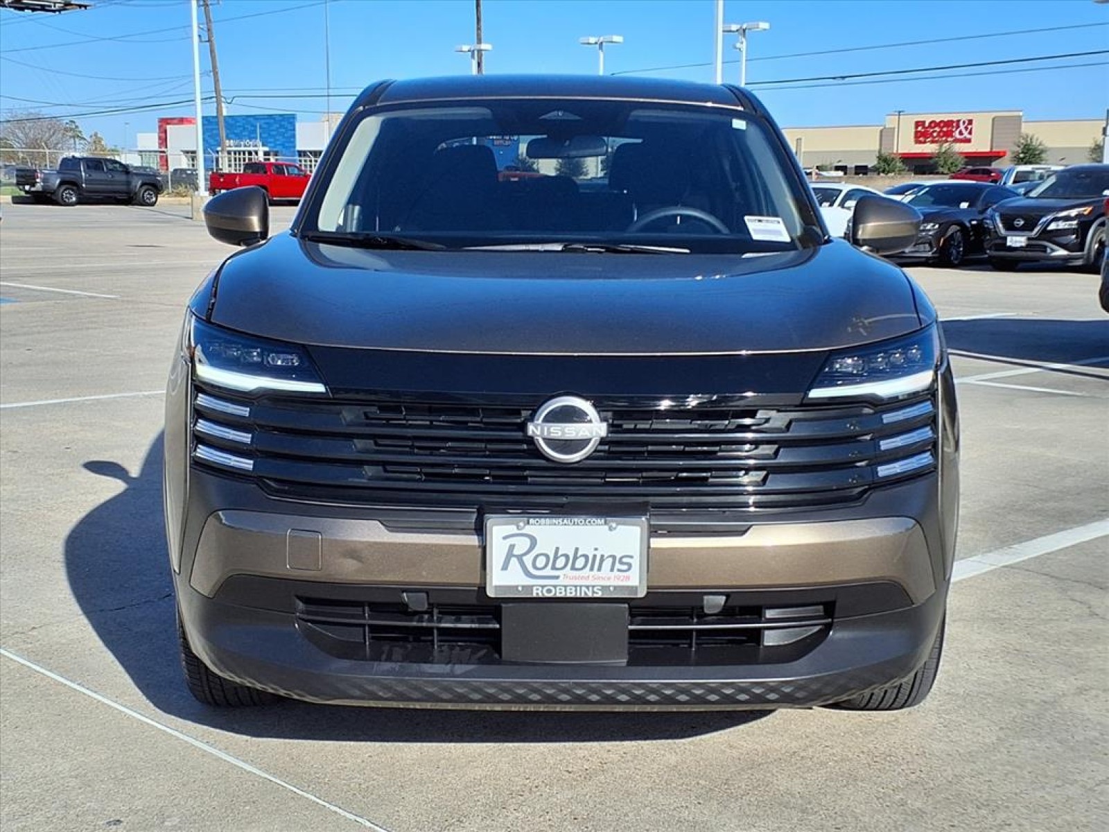 2025 Nissan Kicks SV Brown at Robbins Nissan
