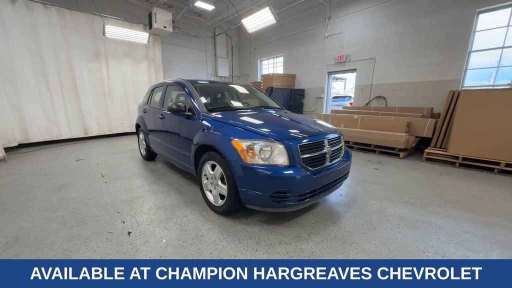 Used 2009 Dodge Caliber SE with VIN 1B3HB48A69D136402 for sale in Royal Oak, MI
