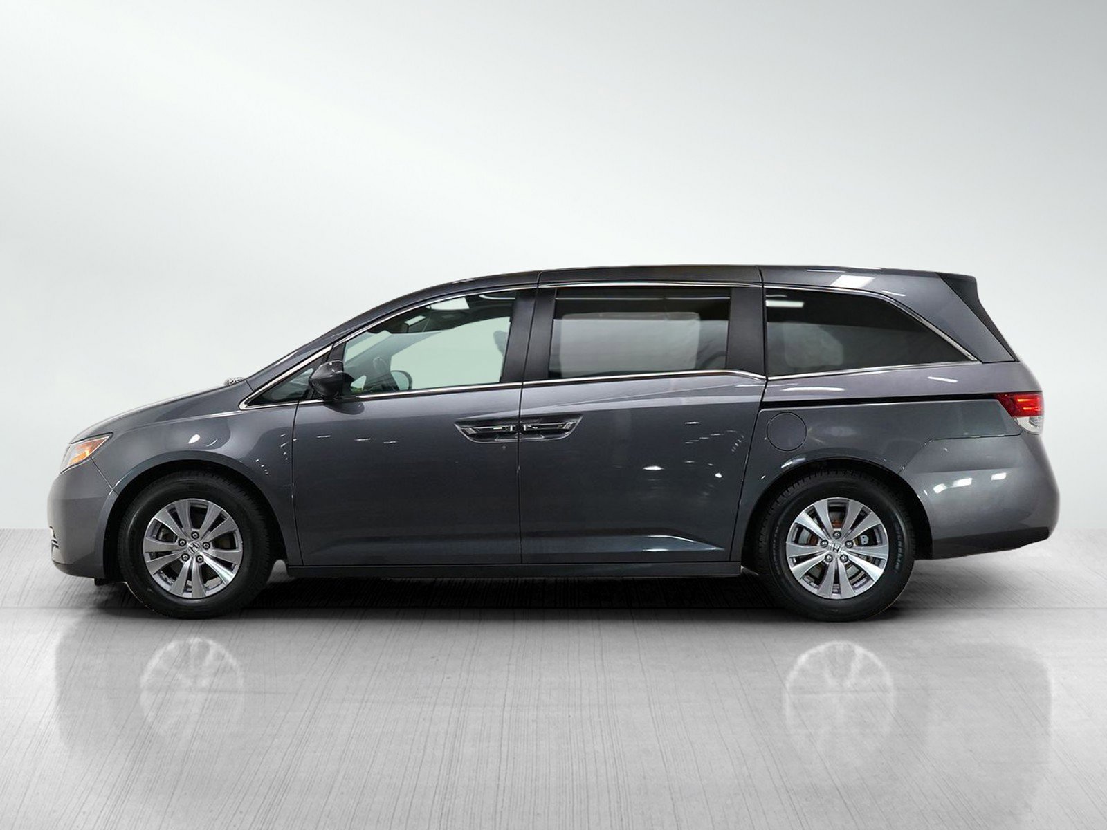 Used 2014 Honda Odyssey EX-L with VIN 5FNRL5H69EB038484 for sale in Burnsville, Minnesota