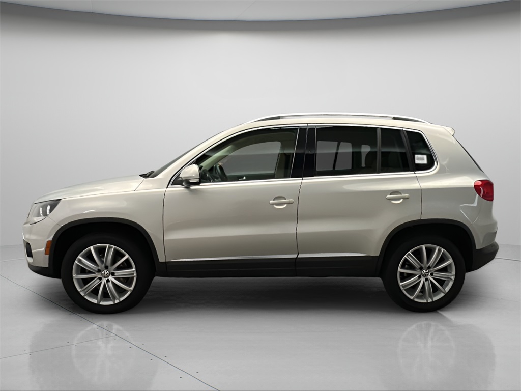 Used 2013 Volkswagen Tiguan SE with VIN WVGBV7AX1DW547856 for sale in Golden, CO