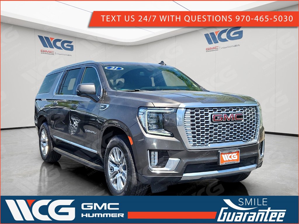 Used 2021 Smokey Quartz Metallic GMC Denali image 1