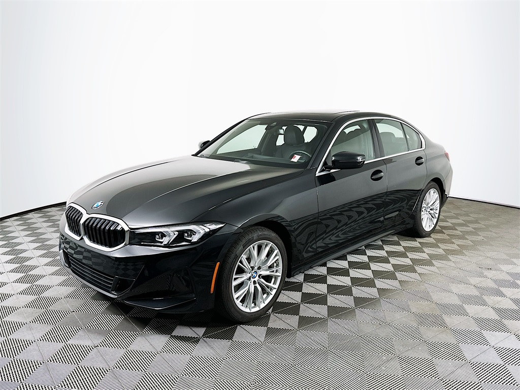 Used 2024 Black Sapphire Metallic BMW 330i xDrive image 1