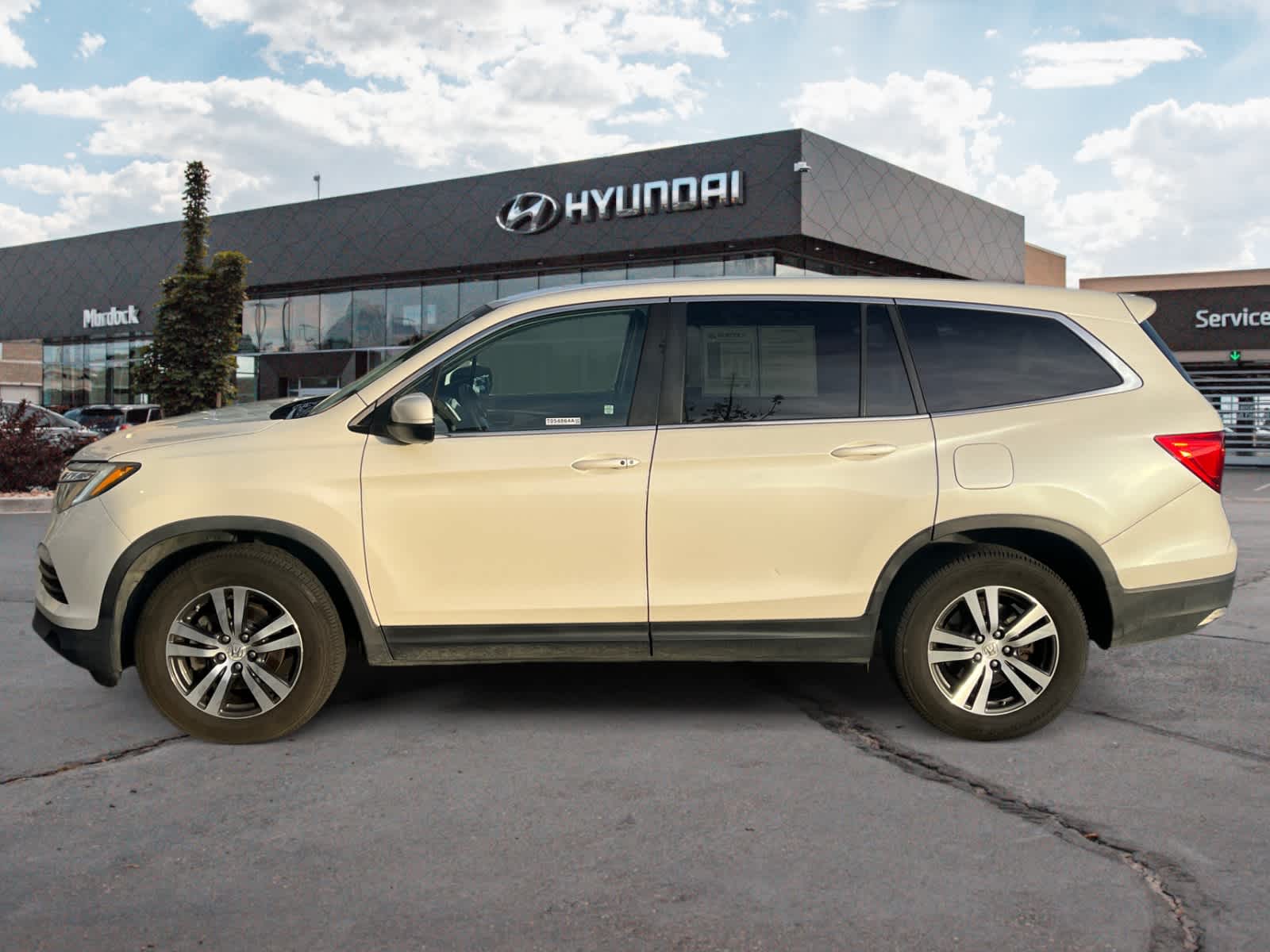 Used 2016 Honda Pilot EX with VIN 5FNYF6H39GB111256 for sale in Lindon, UT