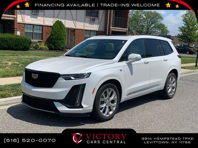 Used 2020 White Cadillac Sport image 1