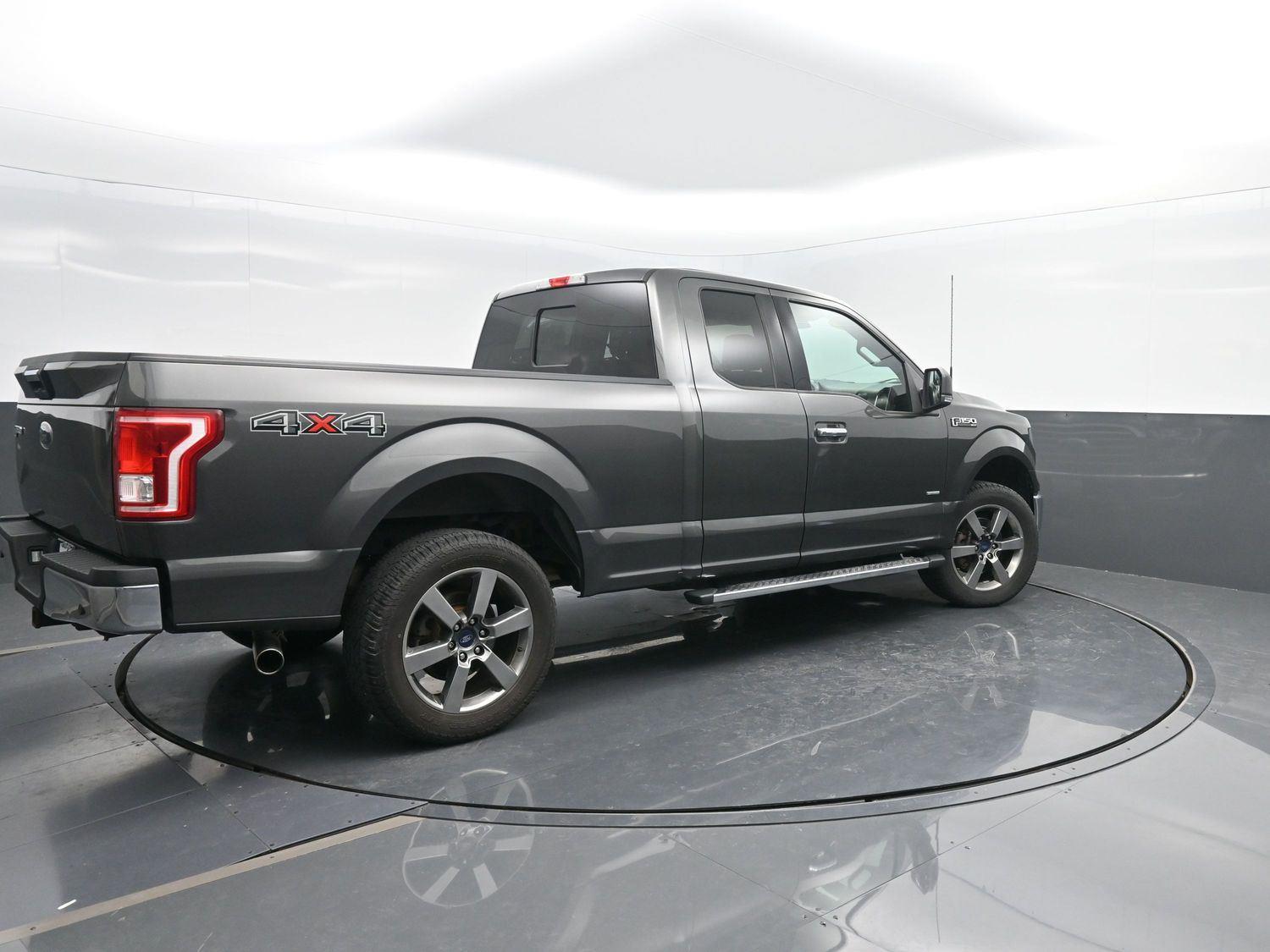 Used 2015 Ford F-150 XLT with VIN 1FTEX1EP2FFC60998 for sale in Charles City, IA