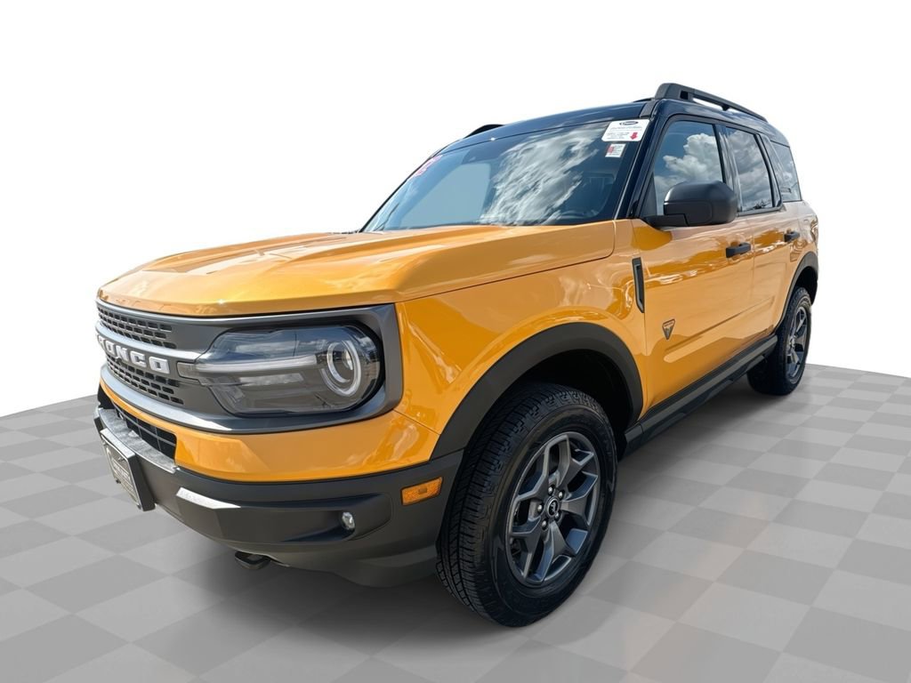 Certified Used 2022 Orange Ford Badlands image 1
