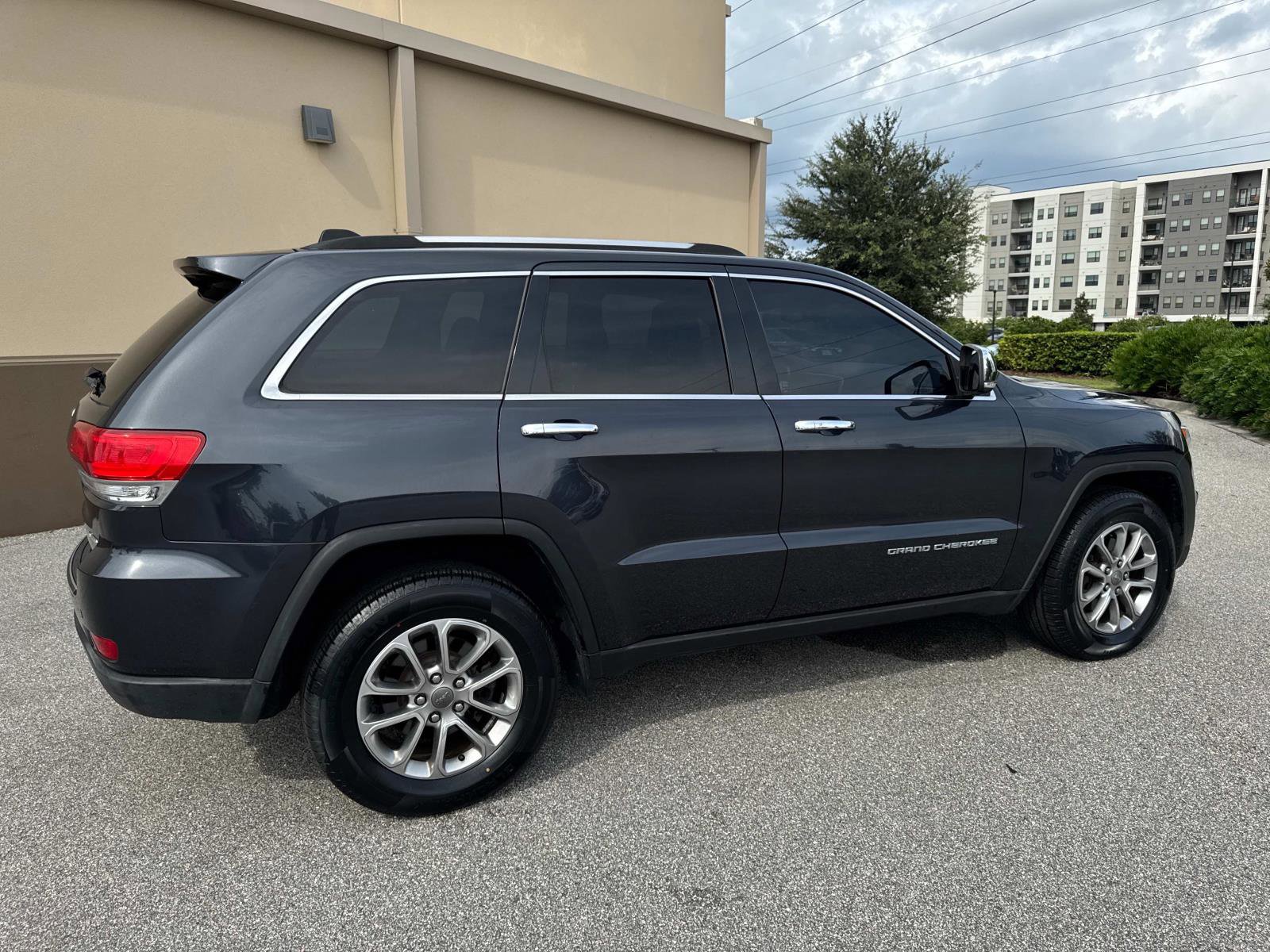 Used 2015 Jeep Grand Cherokee Limited with VIN 1C4RJEBG4FC848496 for sale in Lake Mary, FL