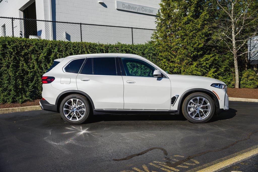 New 2025 Mineral White Metallic BMW xDrive50e image 2