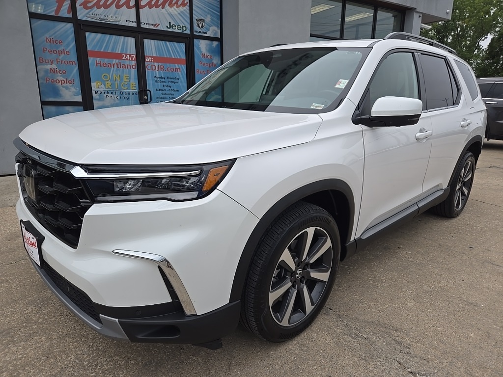 Used 2023 Honda Pilot Elite with VIN 5FNYG1H84PB016034 for sale in Kansas City
