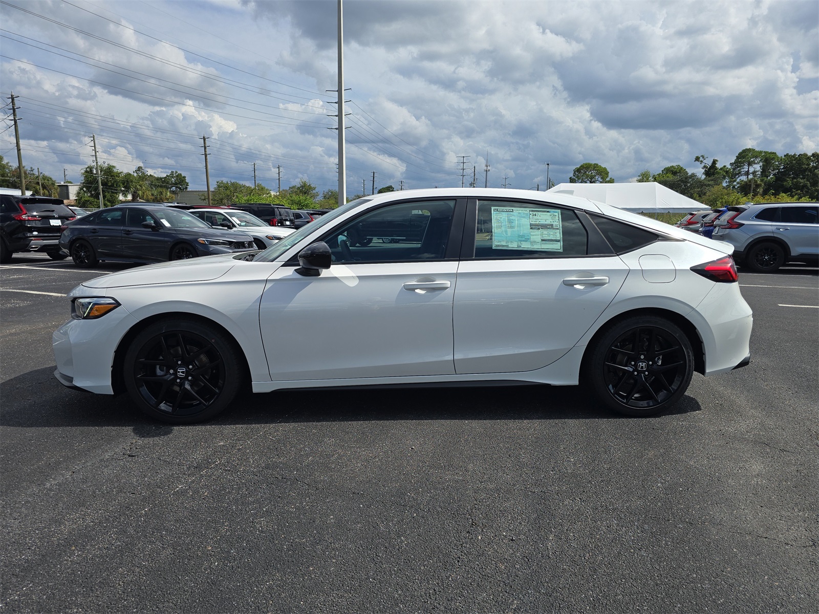 2026 Honda Civic Hatchback Sport photo 4