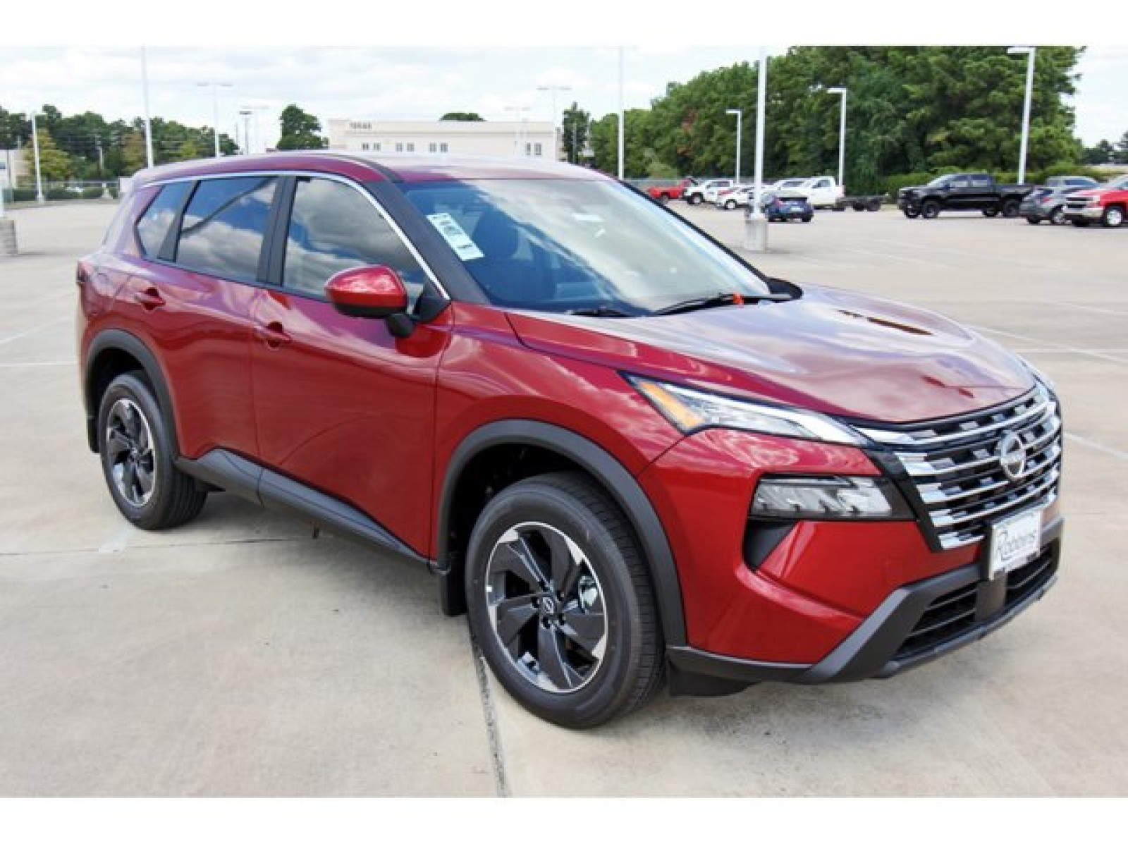 2026 Nissan Rogue SV Red at Robbins Nissan