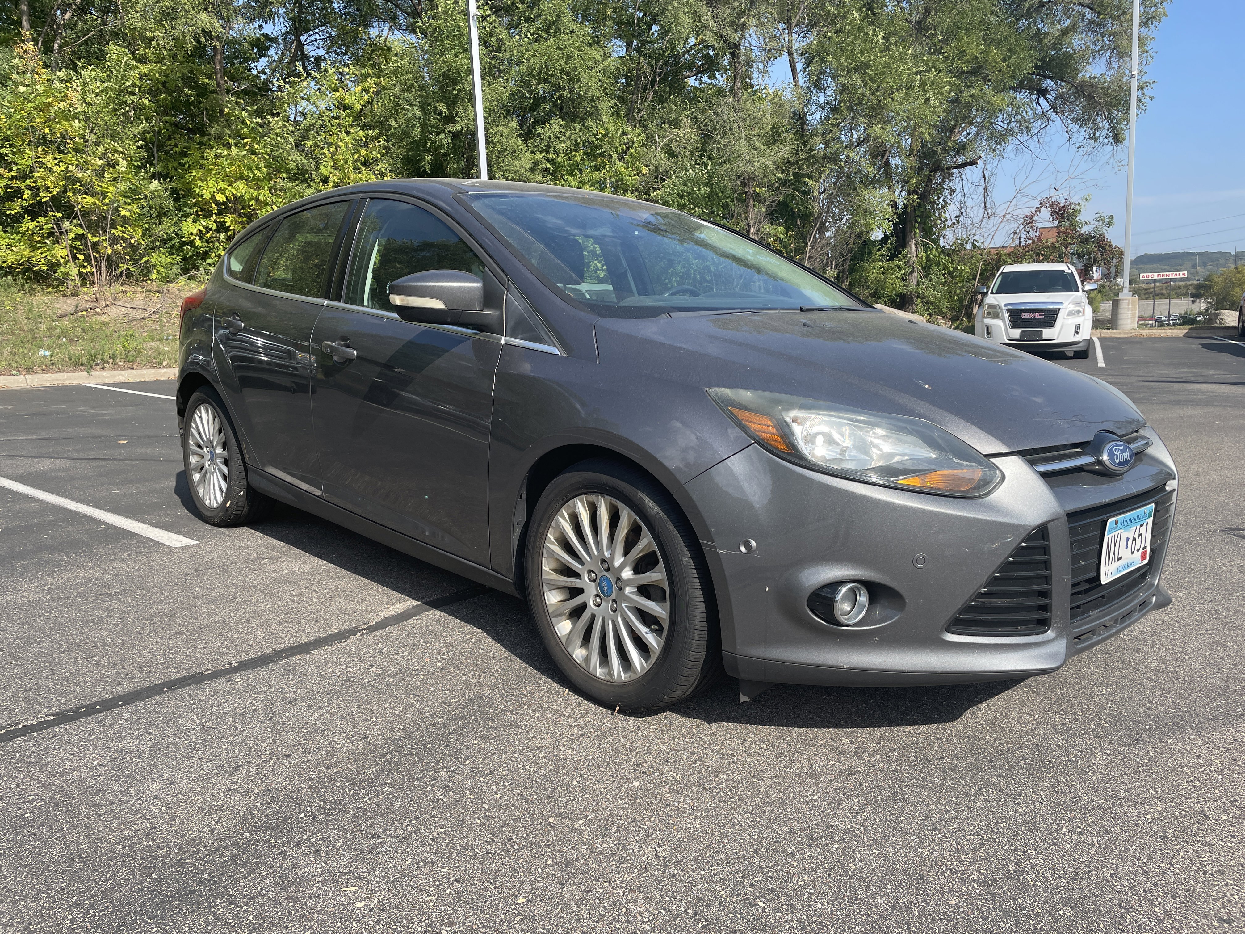 Used 2012 Ford Focus Titanium with VIN 1FAHP3N24CL100136 for sale in South Saint Paul, Minnesota