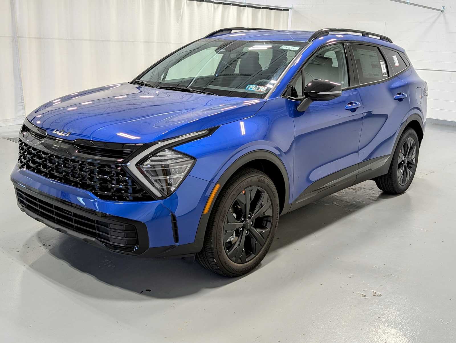 New 2025 Kia Sportage X Line In SAPPHIRE BLUE Greensburg PA K06692 98f7f2e6bfc79657bfec6569d558ed5d