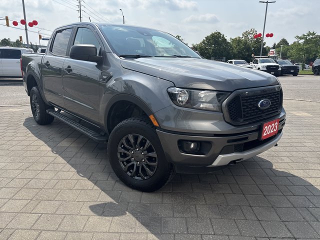 Used 2023 Azure Grey Metallic Tri-Coat Ford XLT image 1