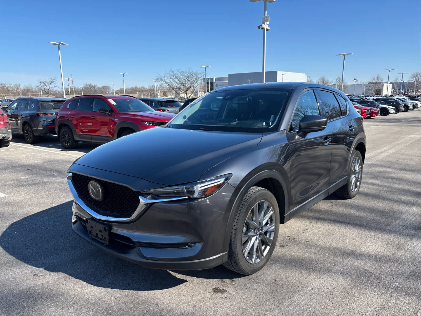 Used 2021 Mazda CX-5 Grand Touring with VIN JM3KFBDMXM1490924 for sale in Kansas City