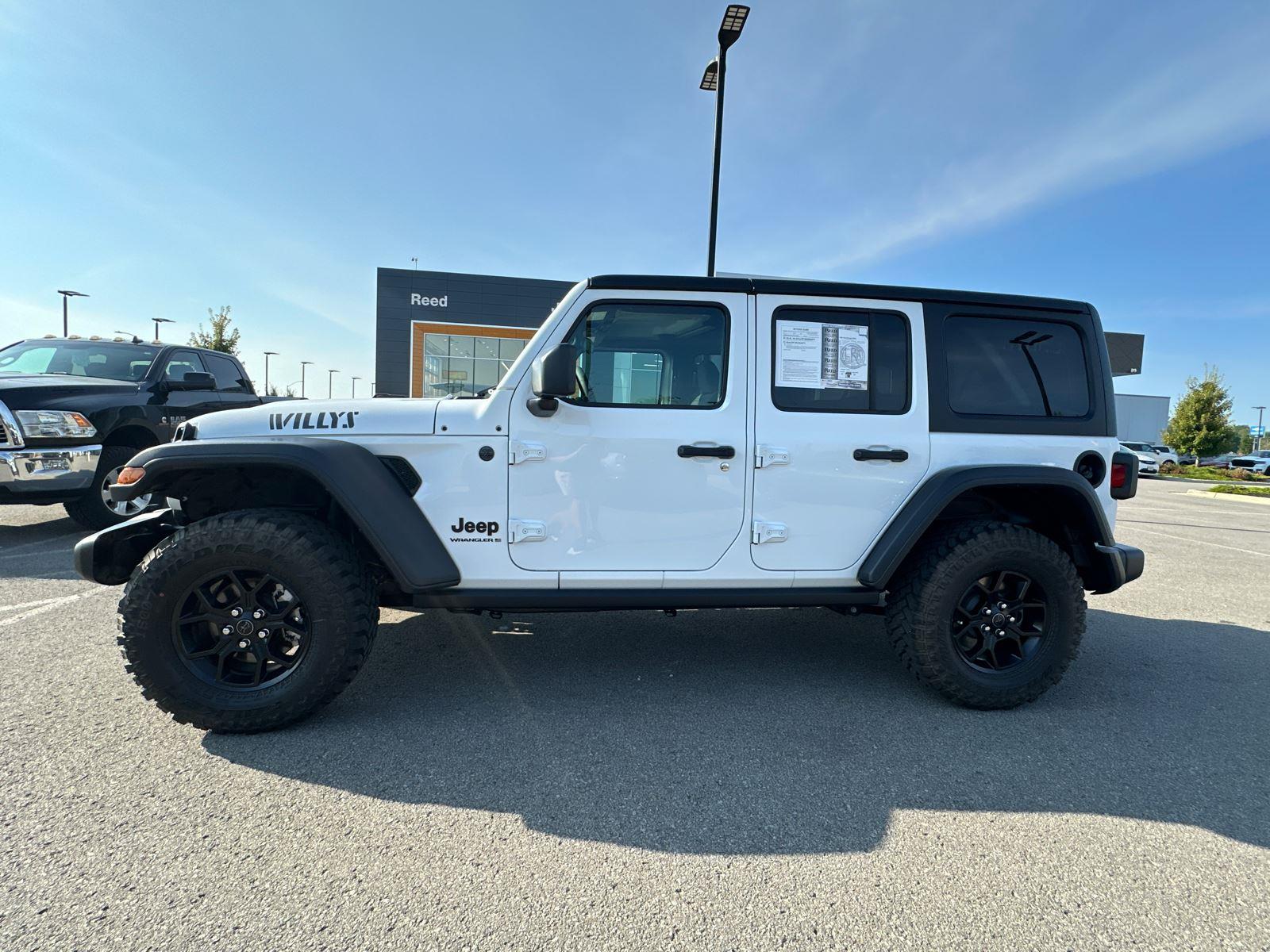 Used 2025 Jeep Wrangler 4-Door Willys with VIN 1C4PJXDN2SW540704 for sale in Kansas City
