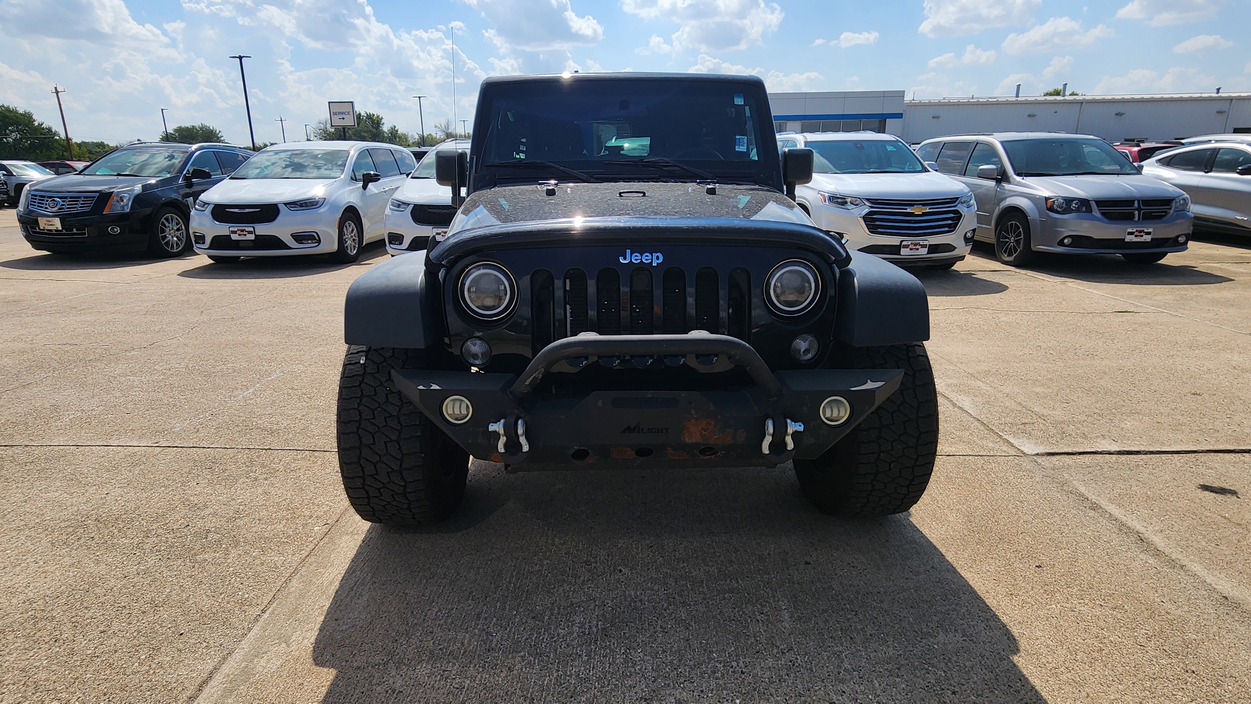 Used 2016 Jeep Wrangler Unlimited Sport with VIN 1C4BJWDG7GL133413 for sale in Lake City, IA