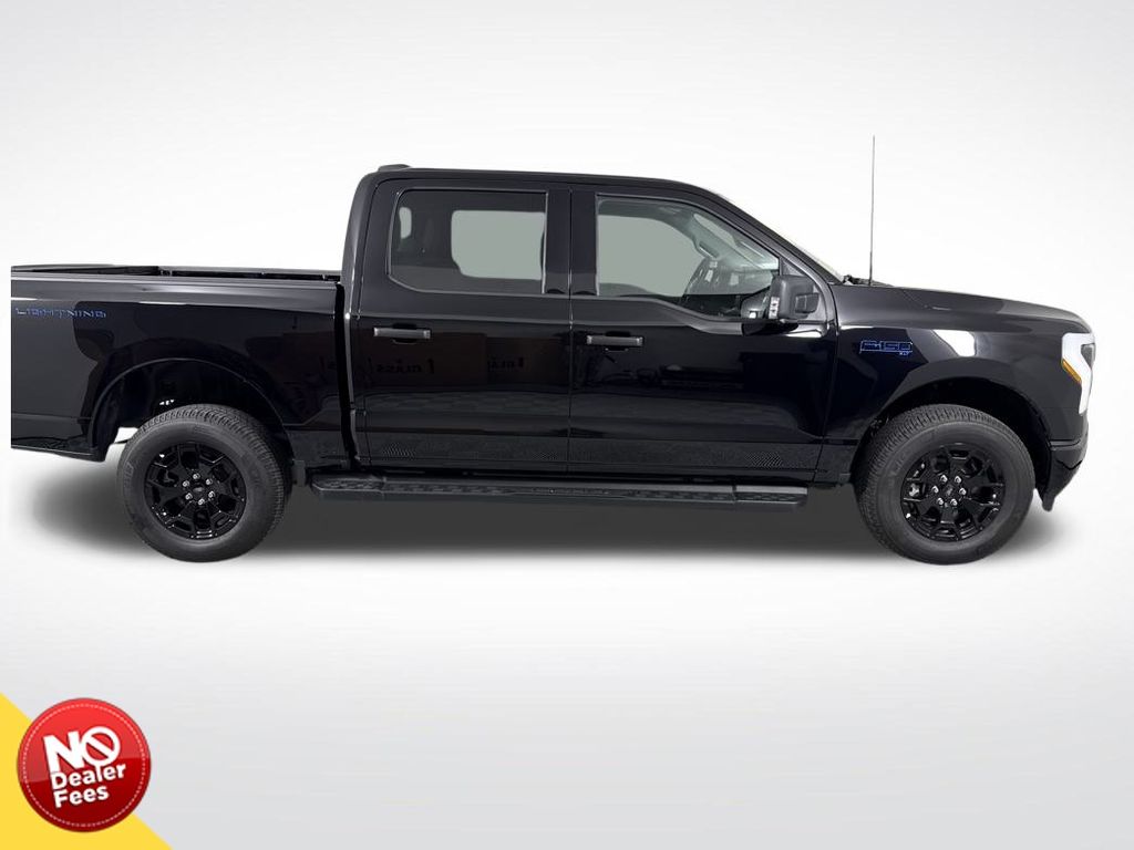 Used 2025 Ford F-150 Lightning XLT with VIN 1FTVW3LK6SWG10620 for sale in Clermont, FL