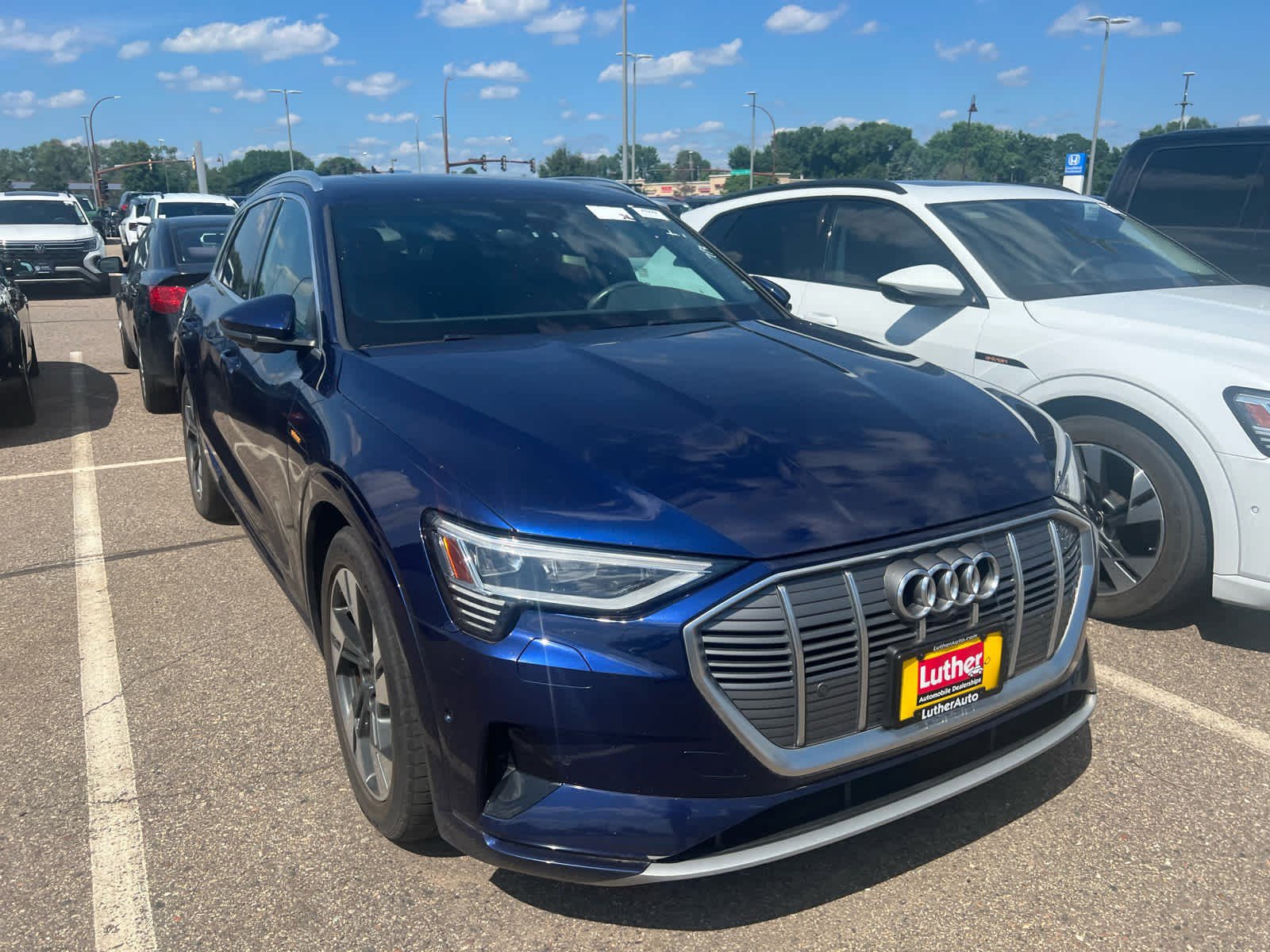 Used 2021 Audi e-tron Premium Plus with VIN WA1LAAGE9MB012105 for sale in Brooklyn Center, Minnesota